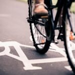 city bicycle riding on bike path pfvh42d
